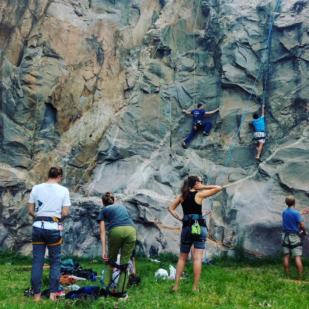 Outdoor rock climbing on natural rock face